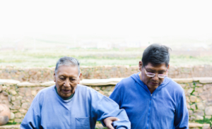 Elderly father and son walking.